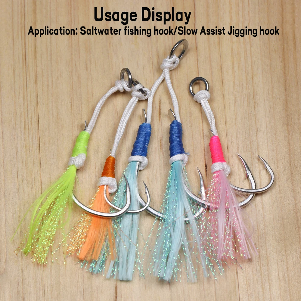 Un conjunto de ganchos de pesca con borlas coloridas