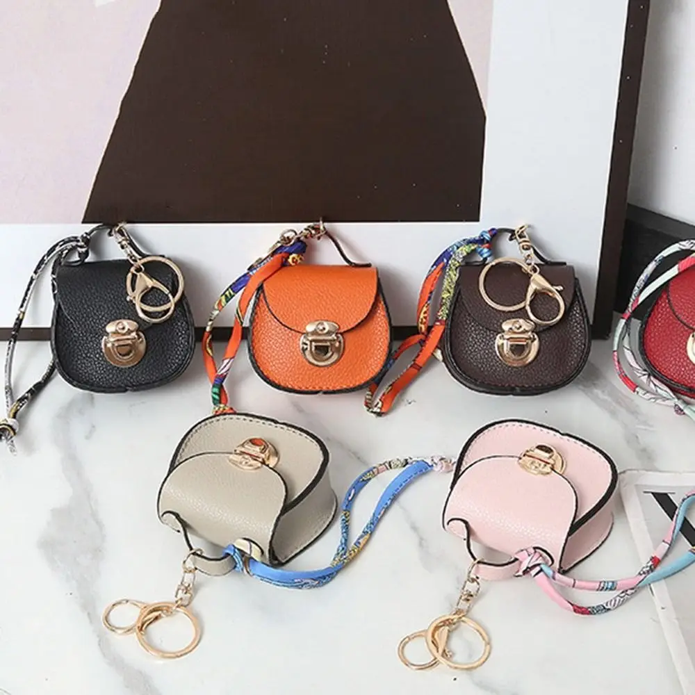Llavero portátil, monedero pequeño, bolso multifunción de cuero de primera calidad para auriculares, Mini bolsa de almacenamiento para mujer - imagen 5