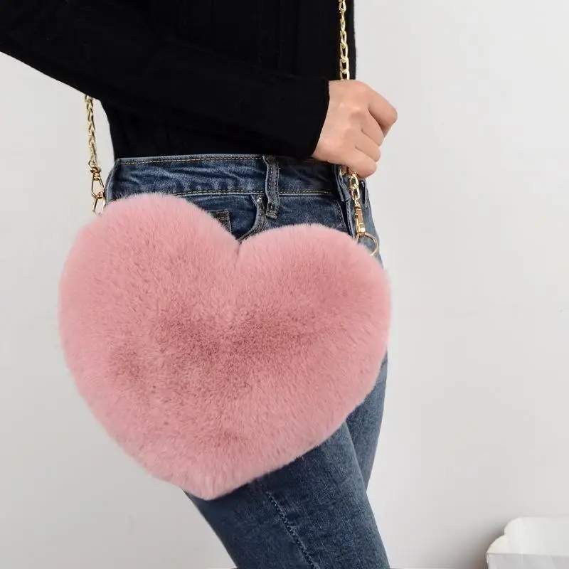 Bolso de felpa en forma de corazón de melocotón