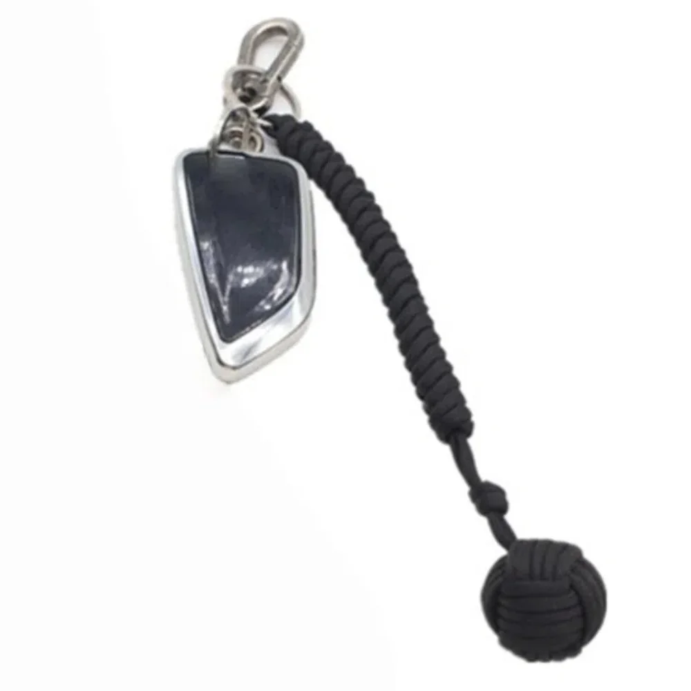 Paracord llavero de supervivencia con bola de acero y puño mono - imagen 2