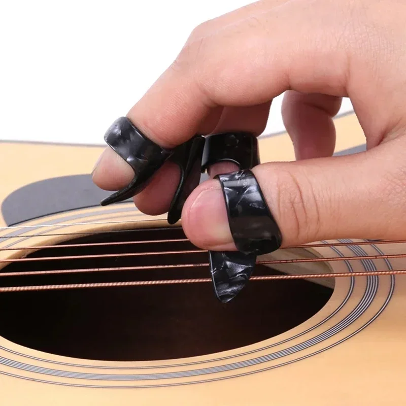 4 unids/set 1 pulgar + 3 dedos púas de guitarra Protector de dedo de silicona púas de cubierta de dedo para principiantes accesorios de guitarra - imagen 3