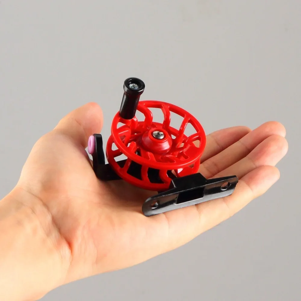Carrete de pesca en hielo, carrete de plástico, carrete de pesca de fundición, aleación de aluminio, mango suave, frenado, carretes de fundición de cebo de Metal - imagen 5