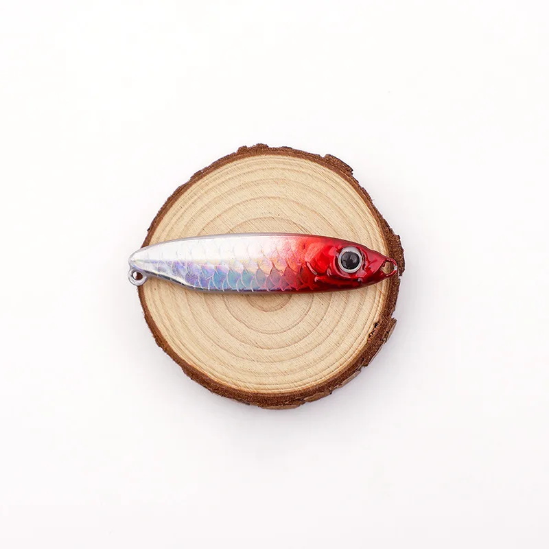 Un señuelo de pesca colorido con un diseño de gradiente perfecto para atrapar peces