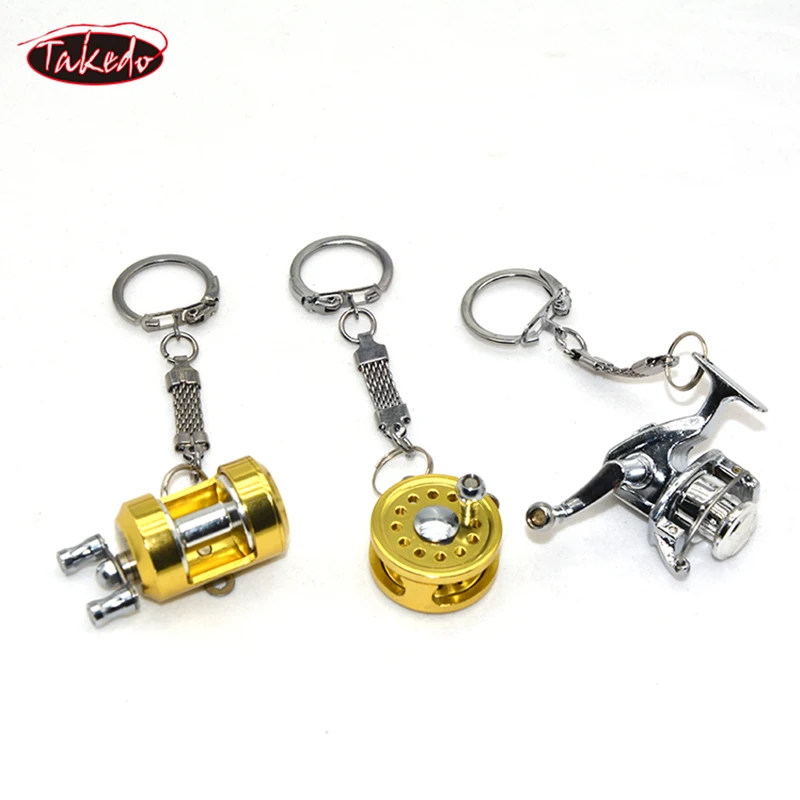 Llavero de carrete de pesca giratorio de Metal TAKEDO, llavero de coche para accesorios de coche, llavero con forma de carrete de pesca de fundición - imagen 5