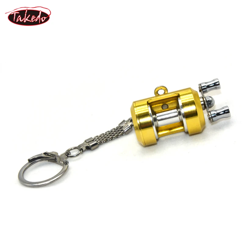 Llavero de carrete de pesca giratorio de Metal TAKEDO, llavero de coche para accesorios de coche, llavero con forma de carrete de pesca de fundición - imagen 4