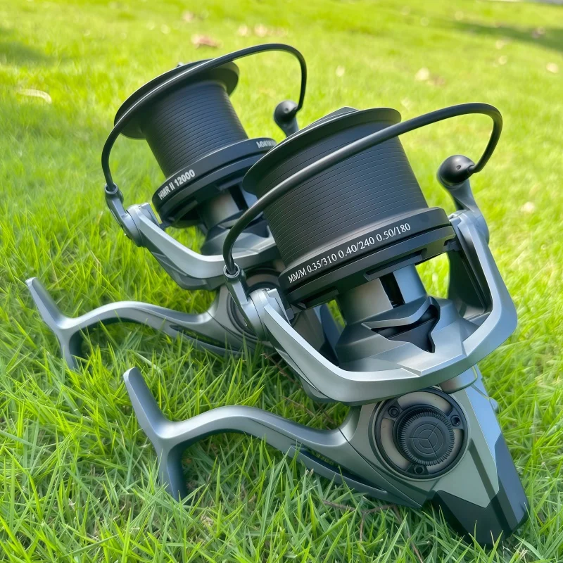 Carrete de pesca giratorio de gran capacidad, serie 9000/12000/14000, 20KG, potente relación de engranaje 4,8:1, rueda de Jigging de agua salada para todas las aguas