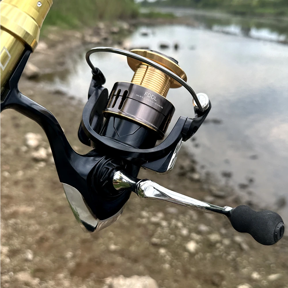 Carrete de pesca giratorio serie OSM2000-7000, alta calidad, relación de transmisión 5,2: 1, arrastre máximo de 8kg, carrete de Metal CNC para agua dulce y salada - imagen 5