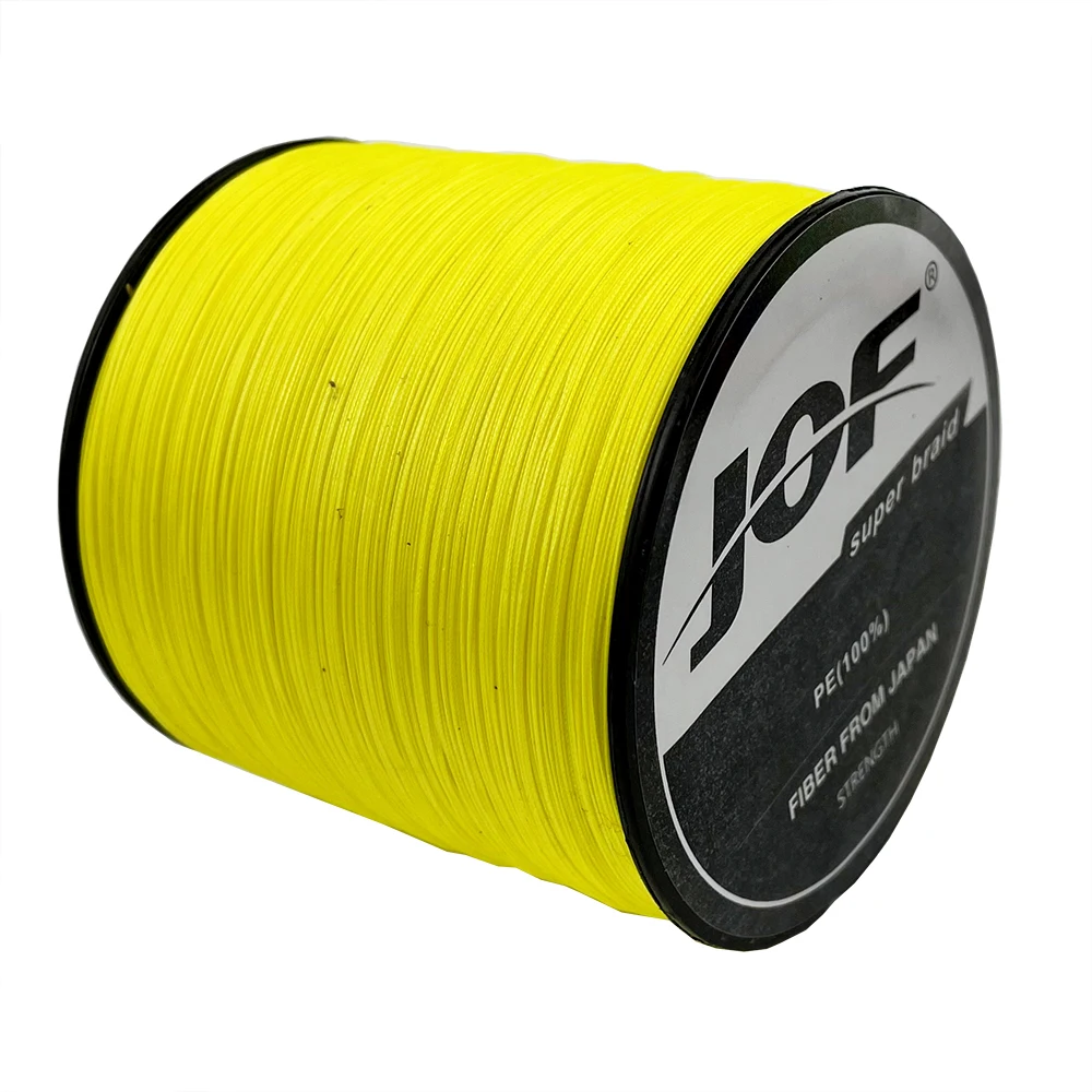 Un carrete amarillo de hilo