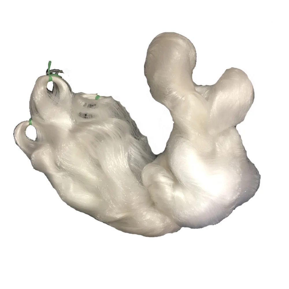 un material rizado blanco y liso, posiblemente representando un tipo de tela o hilo