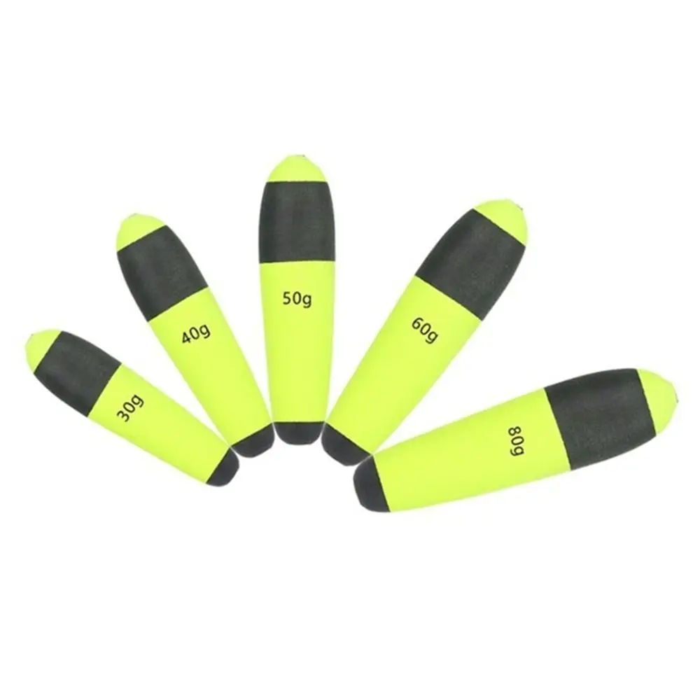 Flotadores de pesca de colores brillantes con indicadores de peso para una fácil identificación
