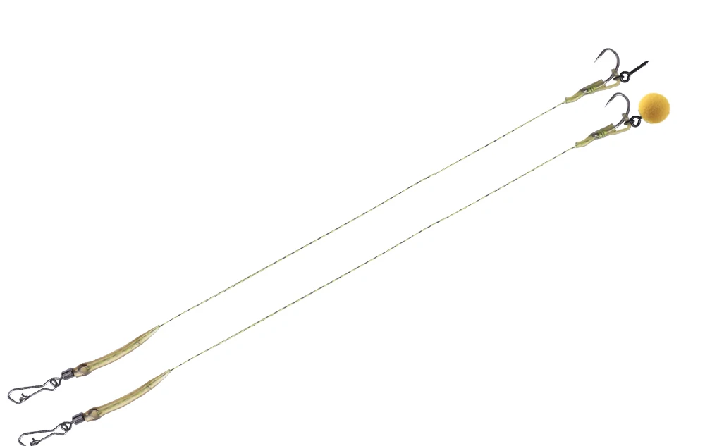 Una configuración de señuelo de pesca con una bola amarilla y un gancho diseñado para una pesca efectiva