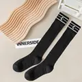 black knee sock