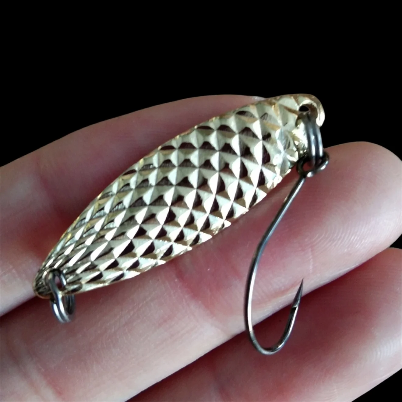 Un gancho de oro y plateado