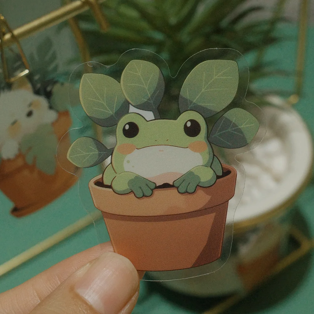 Una linda rana de dibujos animados disfruta de una acogedora maceta de plantas.