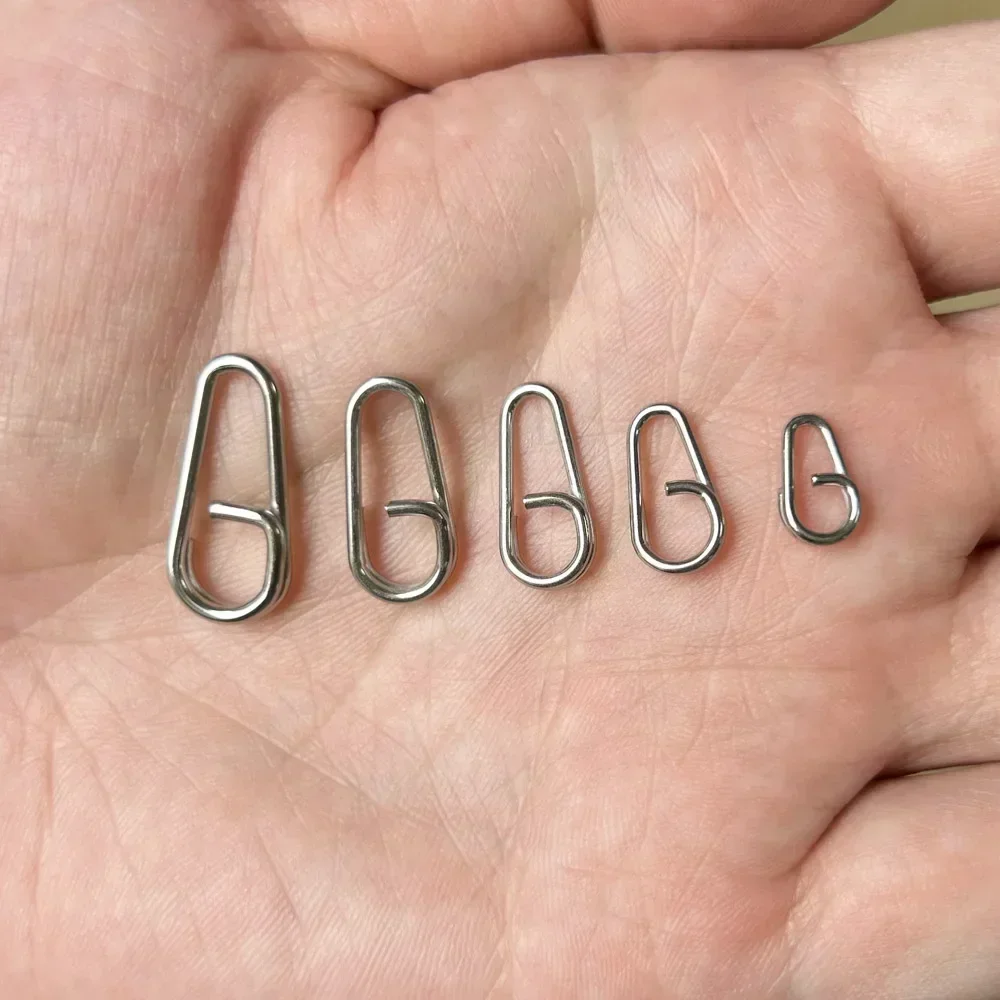 50 unids/caja anillos divididos pesca Snap conectores de señuelo de pesca pesca de agua salada anillos divididos ovalados anillos giratorios de acero inoxidable - imagen 4