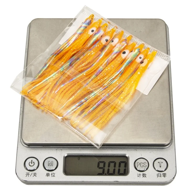 10 Uds. Faldas luminosas de calamar señuelo suave pesca 8cm accesorios de pesca nocturna señuelo cebo pulpo brillo cebo Artificial de goma para atún - imagen 3