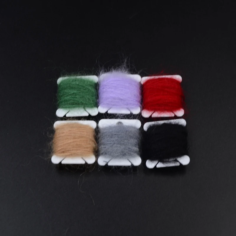 Muestra de los 12 colores disponibles en hilos de Angora para pesca con mosca