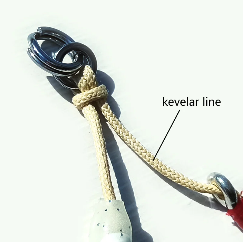 Mustad Inchiku Jig Head Lento con Doble Gancho y Plumas de Asistencia - imagen 2