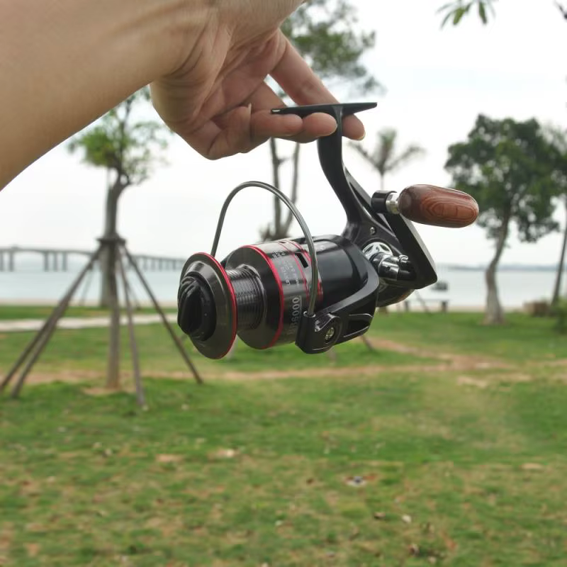 Carrete Spinning Metal 12+1BB Manivela Madera Ambidextro - imagen 4