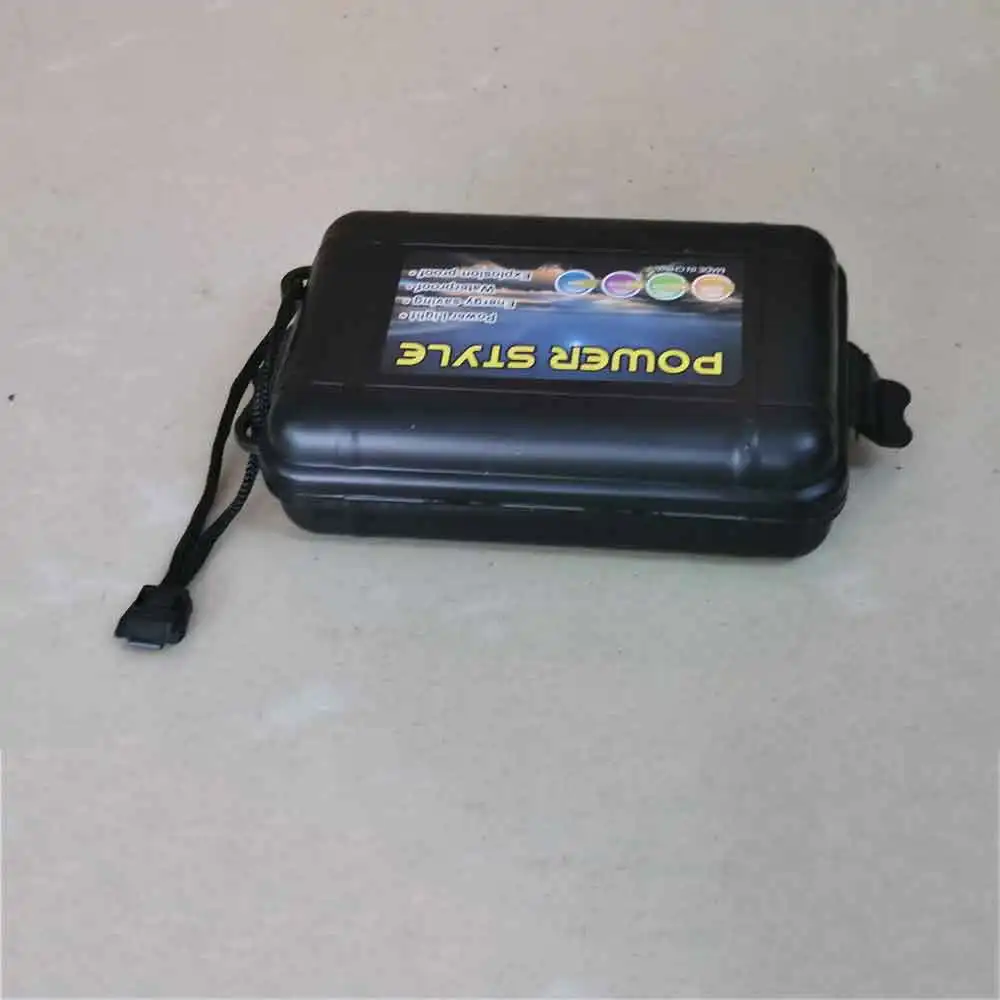 Outdoo Caja almacenamiento con linterna frontal LED para pesca