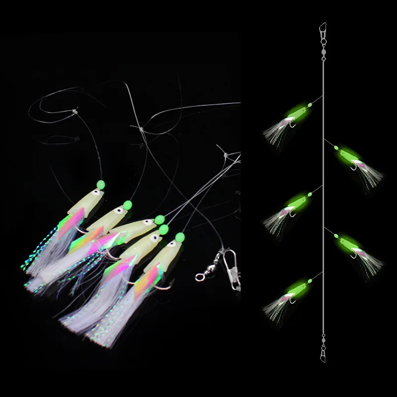 Anzuelo luminoso de acero alto carbono para lubina con plumas de caballa