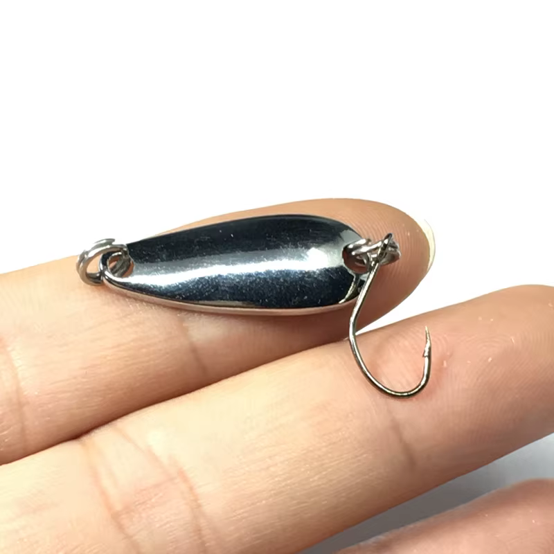 Cebo de pesca metal con lentejuelas acabado dorado