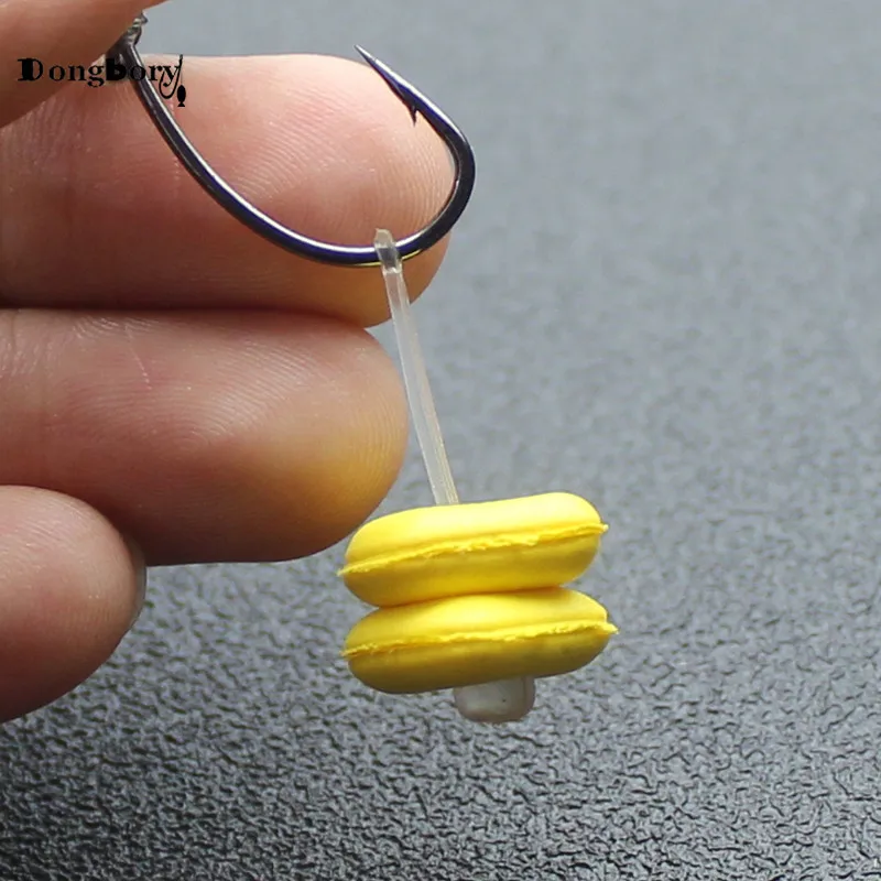 Insertos transparentes colocados en boilies listos para montar