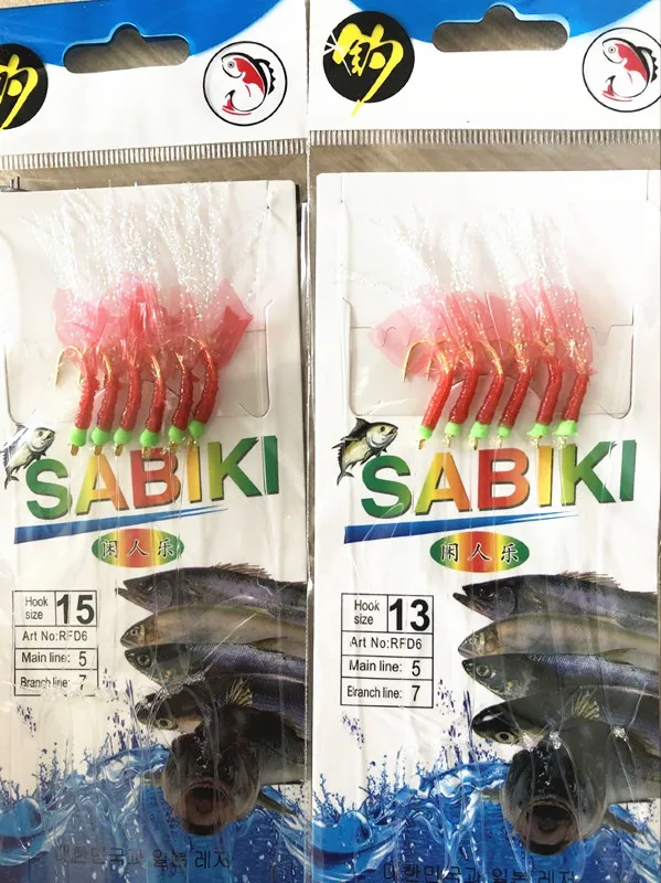 Aparejos Sabiki de goma roja con anzuelos dorados