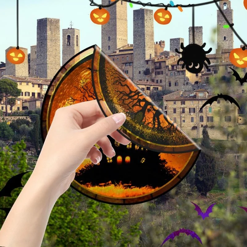 Aplicación de las pegatinas en una ventana de vidrio