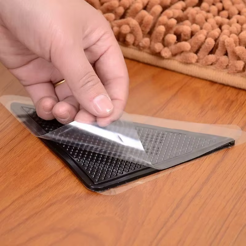 Clips Antideslizantes para Alfombras – Esquinas de Silicona Negra - imagen 5