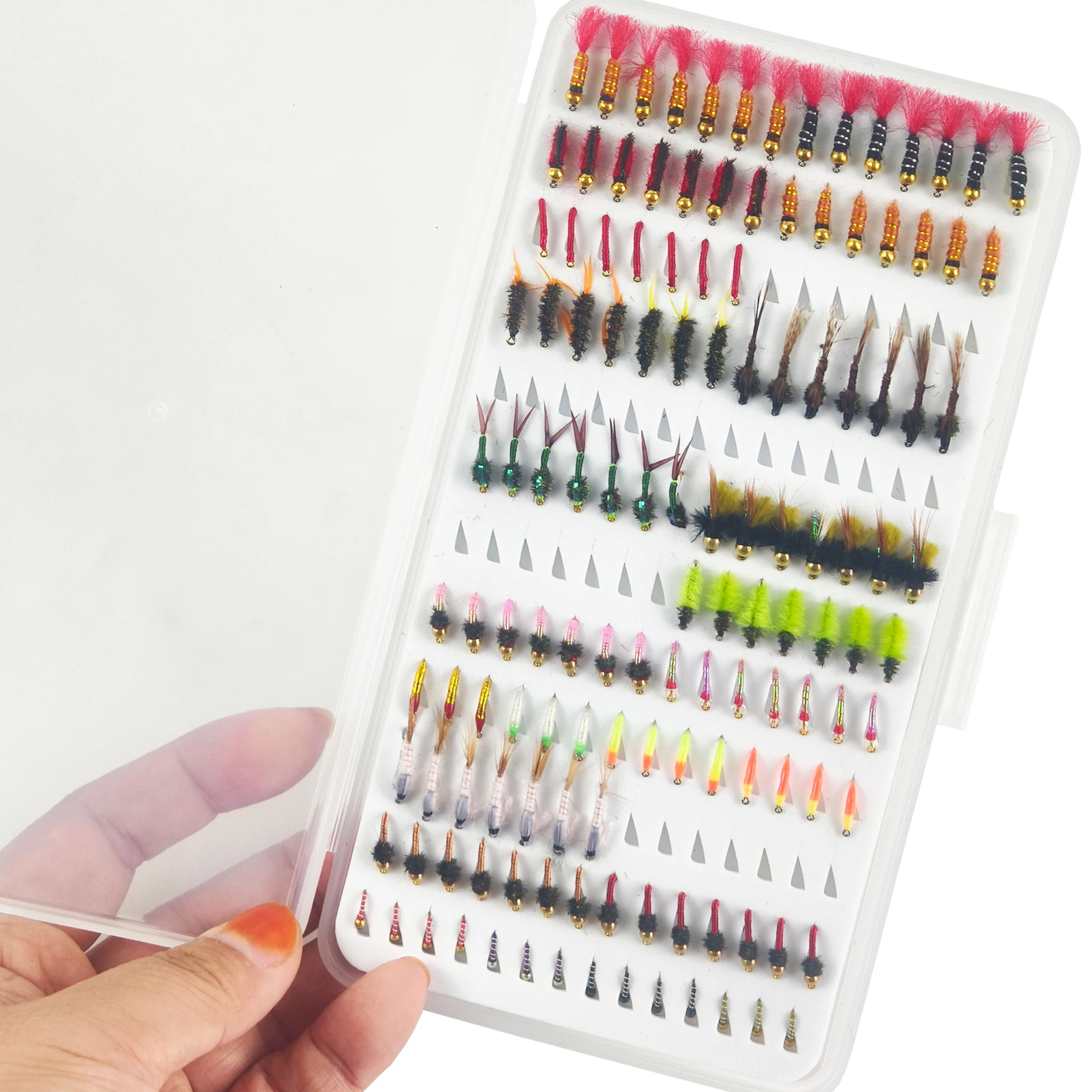 Caja y variedad de moscas para pesca con mosca
