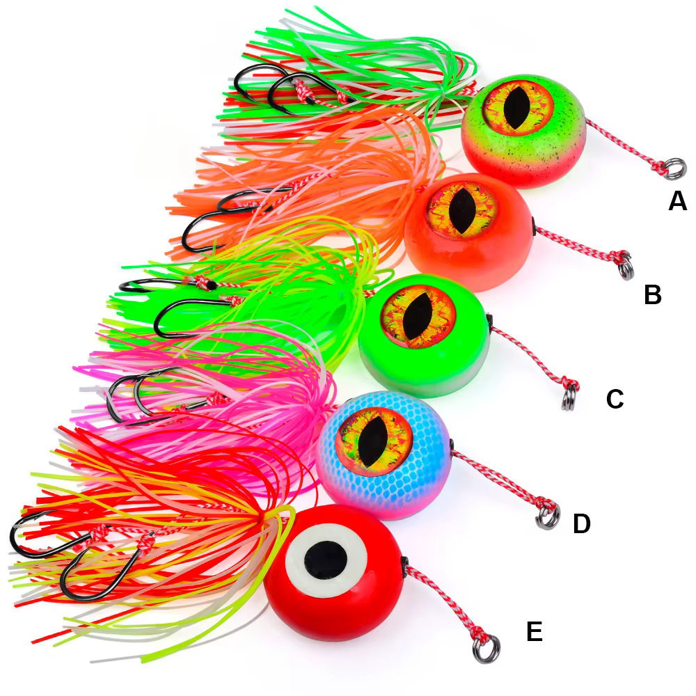 Señuelo Jigging con ojos 3D, cabeza plomo y faldas goma luminoso - imagen 2