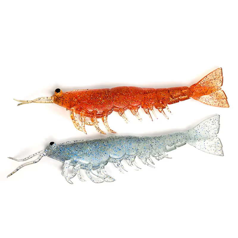 Señuelo de pesca visto de cerca, destacando los detalles de la boca y los ojales