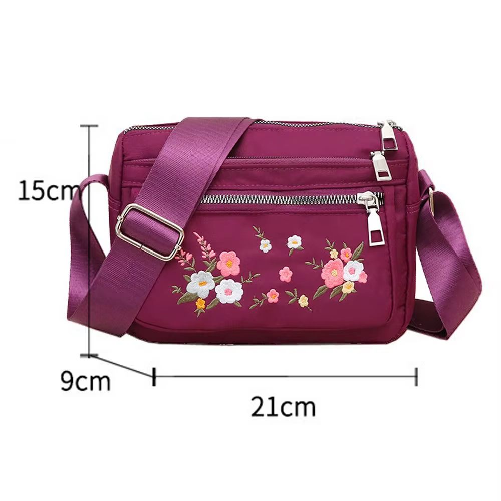 Bolso bandolera de nylon con bordado floral y cremallera