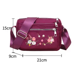 Bolso bandolera de nylon con bordado floral y cremallera