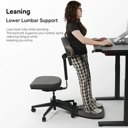 Silla ergonómica Newtral con piernas cruzadas y ruedas, respaldo