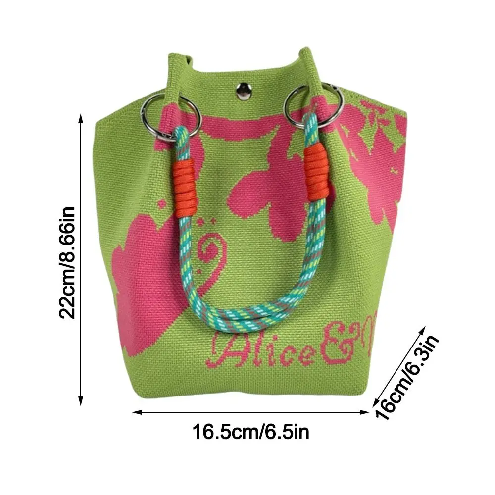 Bolso tipo cubo de punto con diseño cartoon