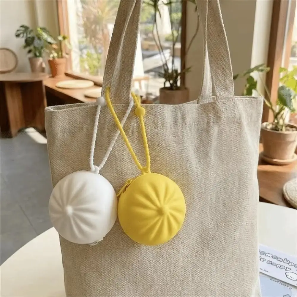 Monedero de silicona con forma de bollo y correa de muñeca - imagen 4