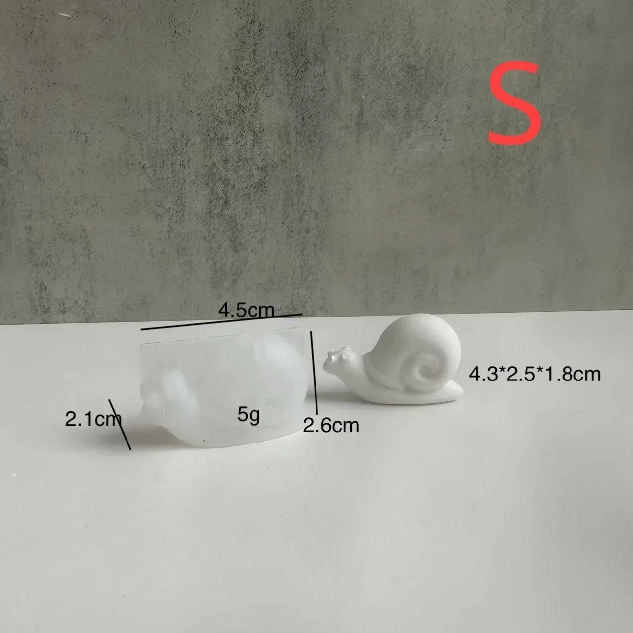 Vista frontal del molde de silicona en forma de caracol