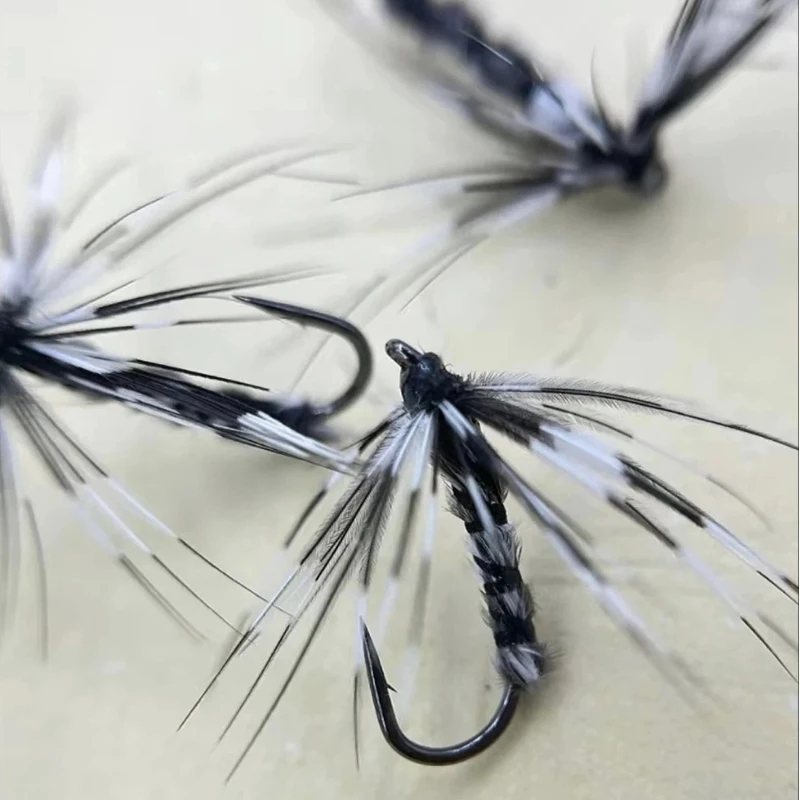 Anzuelos mosquitos imitación pluma negra plateados – alta captura - imagen 3