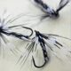 Anzuelos mosquitos imitación pluma negra plateados – alta captura - imagen 3