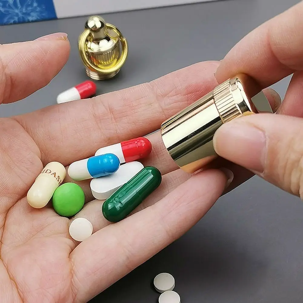 Porta pastillas de latón con llavero impermeable mini dorado - imagen 2