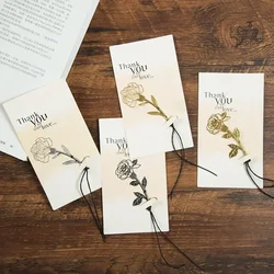 Marcapáginas metálico floral con rosa y llave hueca de latón