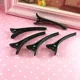 Pinzas negras profesionales para peluquería y estilismo de cabello - imagen 5