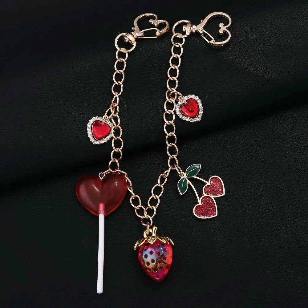 Llavero de cristal rosa cereza con cadena dorada extensible - imagen 2
