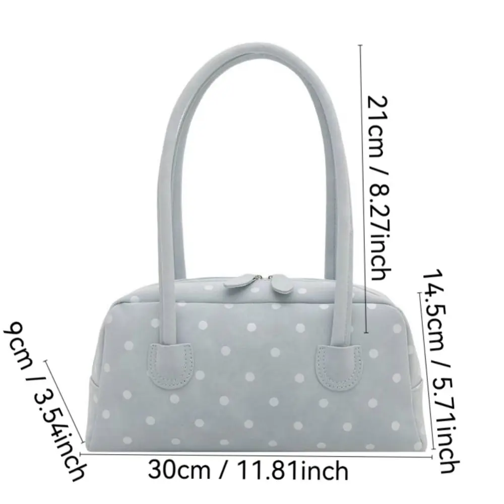 Bolso de hombro con lunares y cremallera