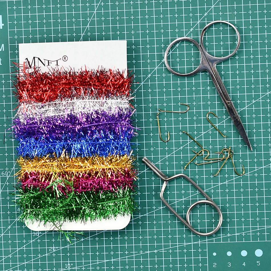 Material de atado con brillo multicolor
