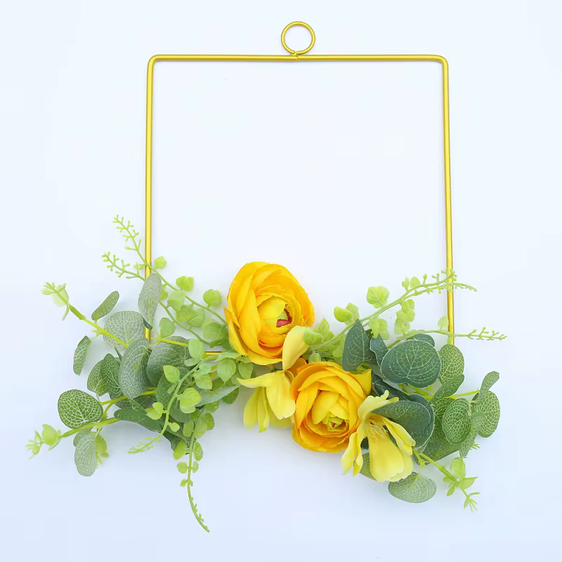 Detalle de las guirnaldas pequeñas y la planta de ágata rosa en la corona decorativa