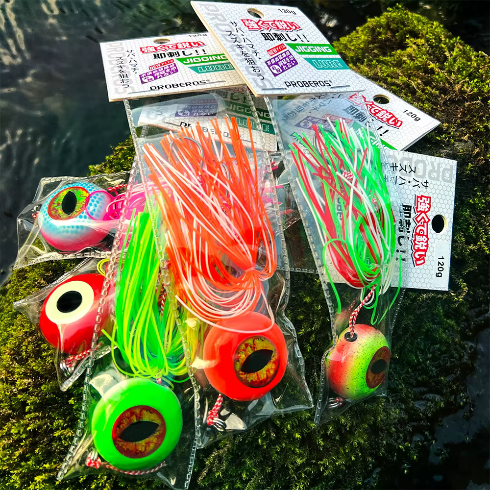 Señuelo Jigging con ojos 3D, cabeza plomo y faldas goma luminoso - imagen 4