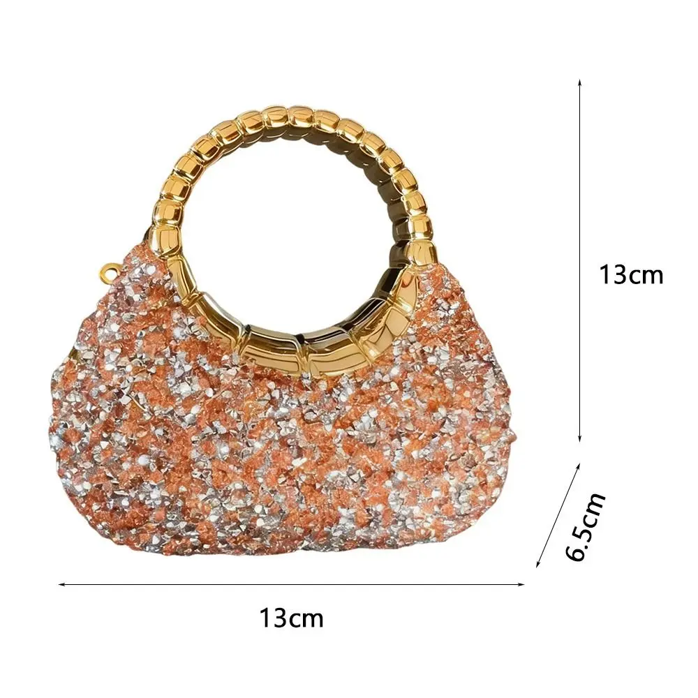 Bolso mini decorado con pedrería en acabado brillante
